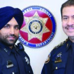 Deputy Sandeep Singh Dhaliwal and Sheriff Adrian Garcia