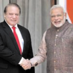 Does this handshake mean anything? Pakistan Prime Minister Nawaz Sharif (left) and India's Prime Minister Narendra Modi in New Delhi