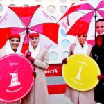 Emirates Cabin Crew mark the celebration of Emirates' fourth daily service from John F. Kennedy International Airport beginning March 8 with a giant Connect 4 Hasbro game in New York's Herald Square, Thursday, March 5, 2015.