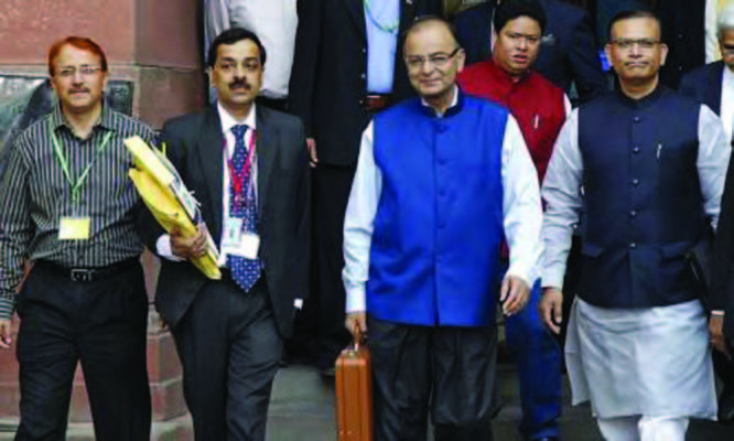 Finance Minister Arun Jaitleyleaves his office to present the 2015-16