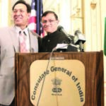Ambassador Dnyaneshwar Mulay (Right) congratulates Tirlok Malik, founder of NRI TV Film Club (left) on coming up with the bright idea of a mini Netflix for NRI movies.