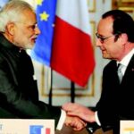 Prime Minister Modi and French President Hollande shake hands at the joint press conference in Paris, April 10
