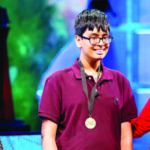 Karan Menon, 14 wearing the medal (center) from New Jersey is the 2015 National Geographic Bee champion.