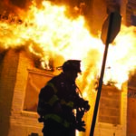 Police and firefighters respond to a building that caught fire on April 27th night