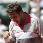 Stanislas Wawrinka exults after beating Djokovic AFP Photo