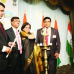 Maharashtra Chief Minister Devendra Phadnavis (left) is ready to light thelamp at the beginning of the function. Also seen in the picture, from left to right, are Consul General Dnyaneshwar Mulay, Mrs. Sadhna Shanker, and chief of Maharashtra Mandal Photos/Gunjesh Desai -Masala Junction