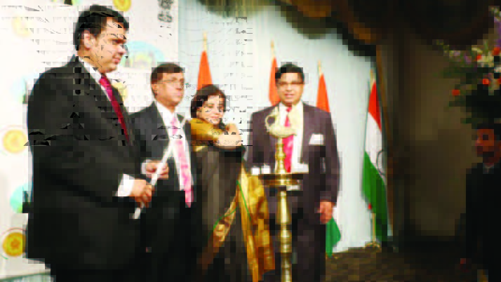 Maharashtra Chief Minister Devendra Phadnavis (left) is ready to light thelamp at the beginning of the function. Also seen in the picture, from left to right, are Consul General Dnyaneshwar Mulay, Mrs. Sadhna Shanker, and chief of Maharashtra Mandal Photos/Gunjesh Desai -Masala Junction