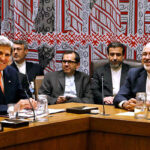 U.S. Secretary of State John Kerry (L) with Iranian Foreign Minister Mohammad Javad Zarif in negotiations in Geneva. (File photo)