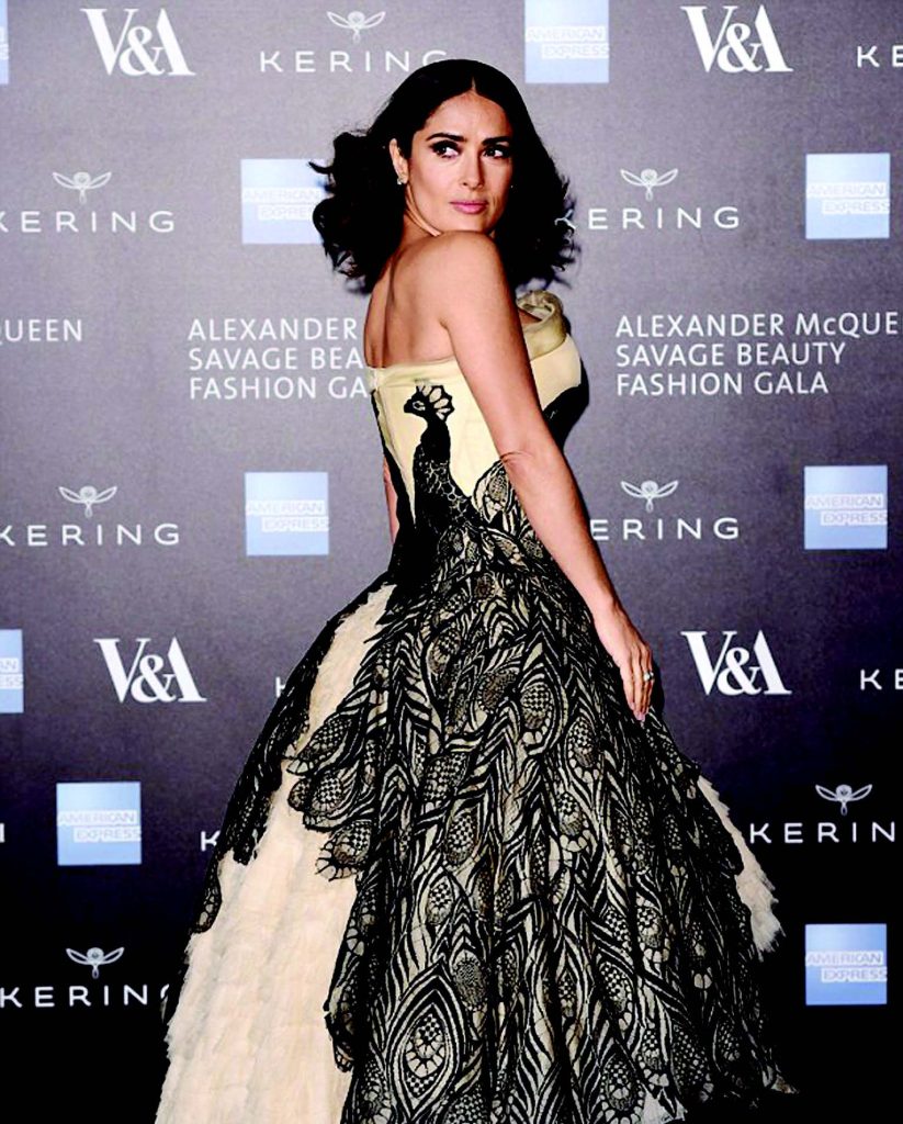 SALMA HAYEK POSES TOPLESS