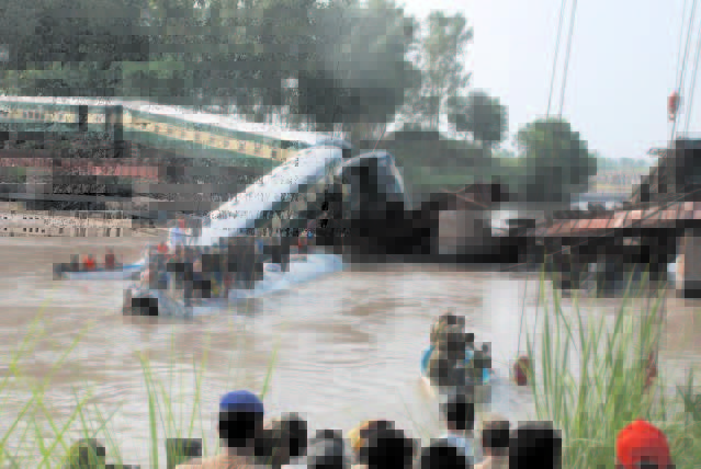 Sabotage suspected as Pakistan troop train plunges into canal