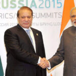 Prime Minister of India Narendra Modi shakes hands with his Pakistani Counterpart Nawaz Sharif during a meeting at UFA in Russia on Friday, July 10. (Photo courtesy PTI)