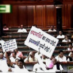 Opposition MPs stormed the Well of the House, holding placards and shouting slogans in Lok Sabha on Monday, Aug 3, 2015, provoking the Speaker Sumitra Mahajan to suspend 25 Congress MPs for five days Photo courtesy PTI