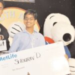 At the check presenting ceremony. ( L to R): MetLife Representative, Chander Sharma, National Champion Shourav Dasari along with MetLife mascot Snoopy and Founder Rahul Walia