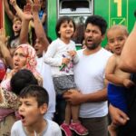 PHOTO: Migrants protest at the railway station in the town of Bicske, Hungary, September 3, 2015. (Reuters: Bernadett Szabo)
