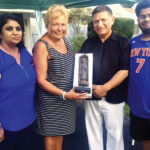 Hicksville legislator in Nassau County Rose Walker visited the Chopras and greeted them. She is flanked by the new citizens, Renu (left), Praveen and Shiv (right)