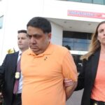 Harendra Singh is led out of the FBI office in Melville early Wednesday, Sept. 9, 2015.