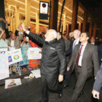 PM Modi waves to the Jubilant Indian Americans to welcome him at Hotel Waldorf Astoria, September 23 | Photo/ Mohammed Jaffer-SnapsIndia