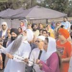 Ecstatic sangat sings Gurbani at the Prabhat Pheri taken out in Gurdwara Glen Cove on September 27