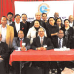 Speakers, organizers and some participants at the recently held community meeting on NRI Property Issues in India. Seated in front row, from L. to R.: Kerala Center President Thambi Thalappillil, GOPIO Founder President Dr. Thomas Abraham, GOPIO-New York President and panelist Anand Ahuja, Panelist Pambayan Meyyan, GOPIO-New York Founder President Lal Motwani and Kerala Center Executive Director E.M. Stephen