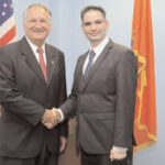 Nassau County Comptroller George Maragos (left) shaking hands with the newly appointed Director of South East/Asian Affairs Dilip Chauhan