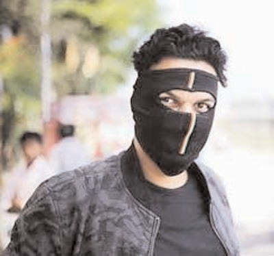 Masked man kills