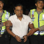 Gangster Chhota Rajan being taken to the Bali airport from where he was deported to Delhi.