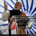 Modi at the mega diaspora address at the iconic Wembley Stadium in north London