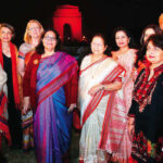 'Orange the World' kicks off in India with illumination of the iconic monument India Gate in orange. Delegates with the Lok Sabha Speaker Sumitra Mahajan in the backdrop of India Gate (Photo/ courtesy UN Women)