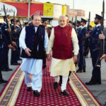 Prime Minister Narendra Modi with Pakistan Prime Minister Nawaz Sharif on his Christmas day visit to Pakistan