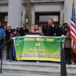 Participants at the Interfaith vigil at Nassau County Executive building, January 1