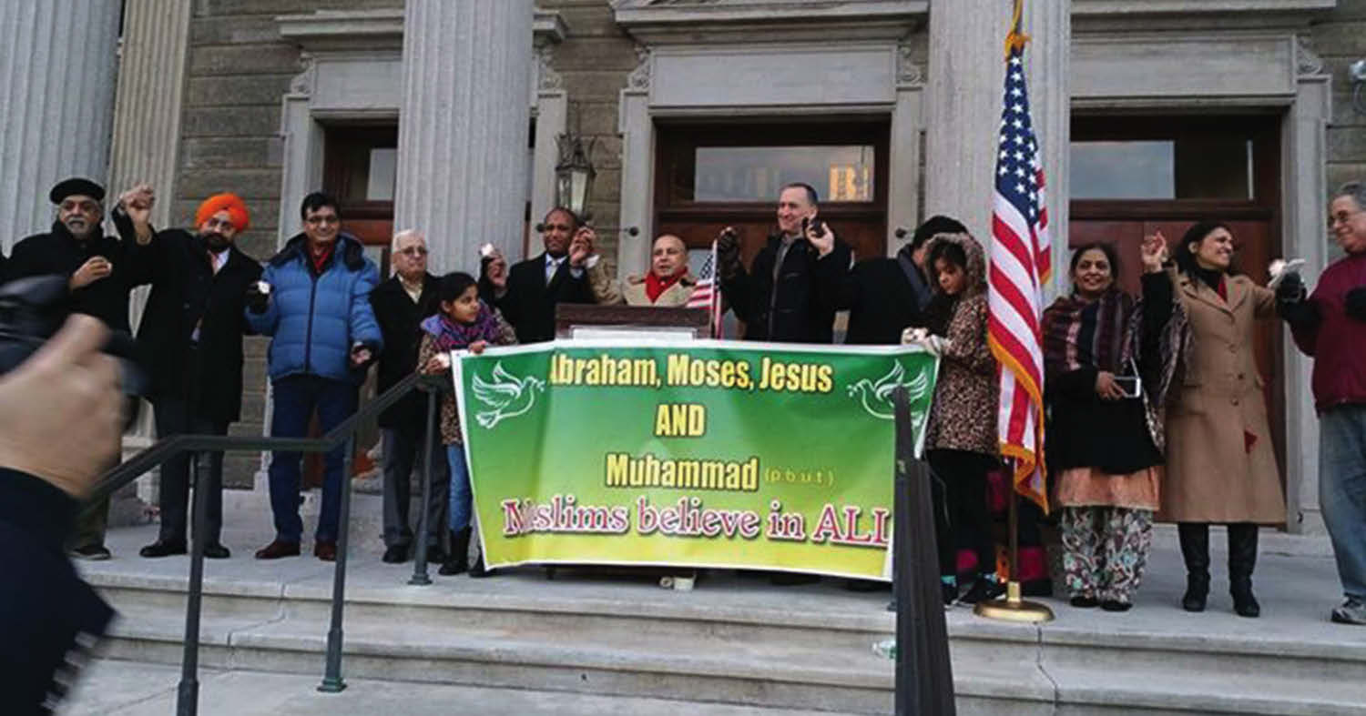 Participants at the Interfaith vigil at Nassau County Executive building, January 1