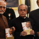 President Pranab Mukherjee with Vice President Hamid Ansari and Senior Congress leader Karan Singh during the release of his memoir “The Turbulent Years- 1980-96