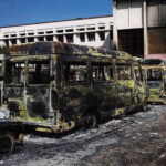 Charred vehicles pile up in Rohtak.