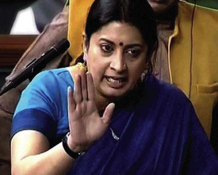 HRD Minister Smriti Irani speaks in the Lok Sabha in New Delhi on Wednesday.