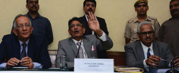 Justice Lodha (center) with the other two committee members at a press conference in New Delhi.