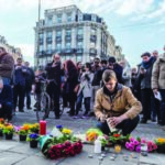 Paying homage with flowers and candles to the fallen in Terrorist attack in Brussels