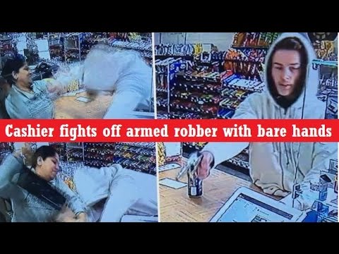Cashier fights off armed robber with bare hands
