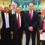 Keynote speaker Preet Bharara seen with officials of QCC