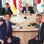 Japanese Prime Minsiter Shinzo Abe, foreground center left, and U.S. President Barack Obama, foreground center right, smile at photographers with other leaders of Group of Seven industrial nations, clockwise from left, French President Francois Hollande, British Prime Minister David Cameron, Canadian Prime Minister Justin Trudeau, European Commission President Jean-Claude Juncker, European Council President Donald Tusk, Italian Prime Minister Matteo Renzi and German Chancellor Angela Merkel, at the start of the second working session of the G-7 summit meetings in Shima, Mie Prefecture, Japan, Thursday, on May 26, 2016. (AP)