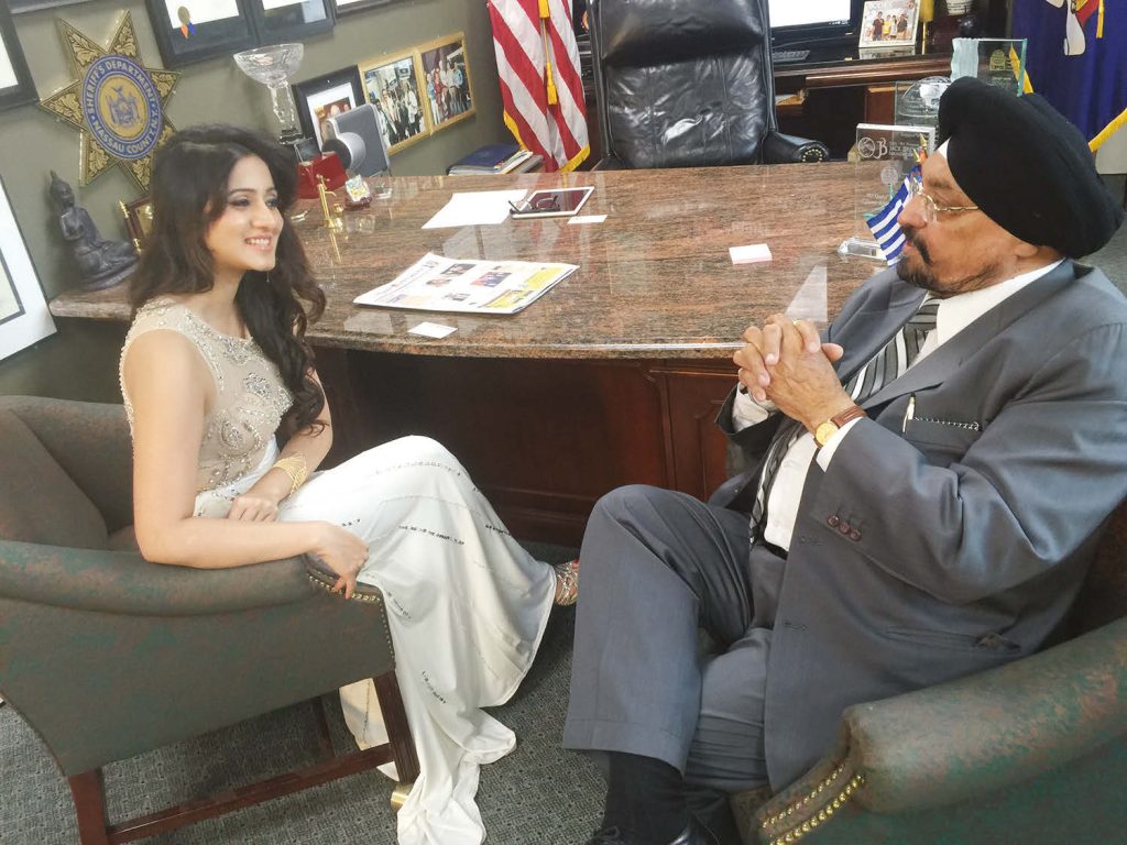 Harshika Poonacha in conversation with The Indian Panorama editor Prof. Indrajit S Saluja at Bobby Kumar’s Senior Care Center in Hicksville, May 23