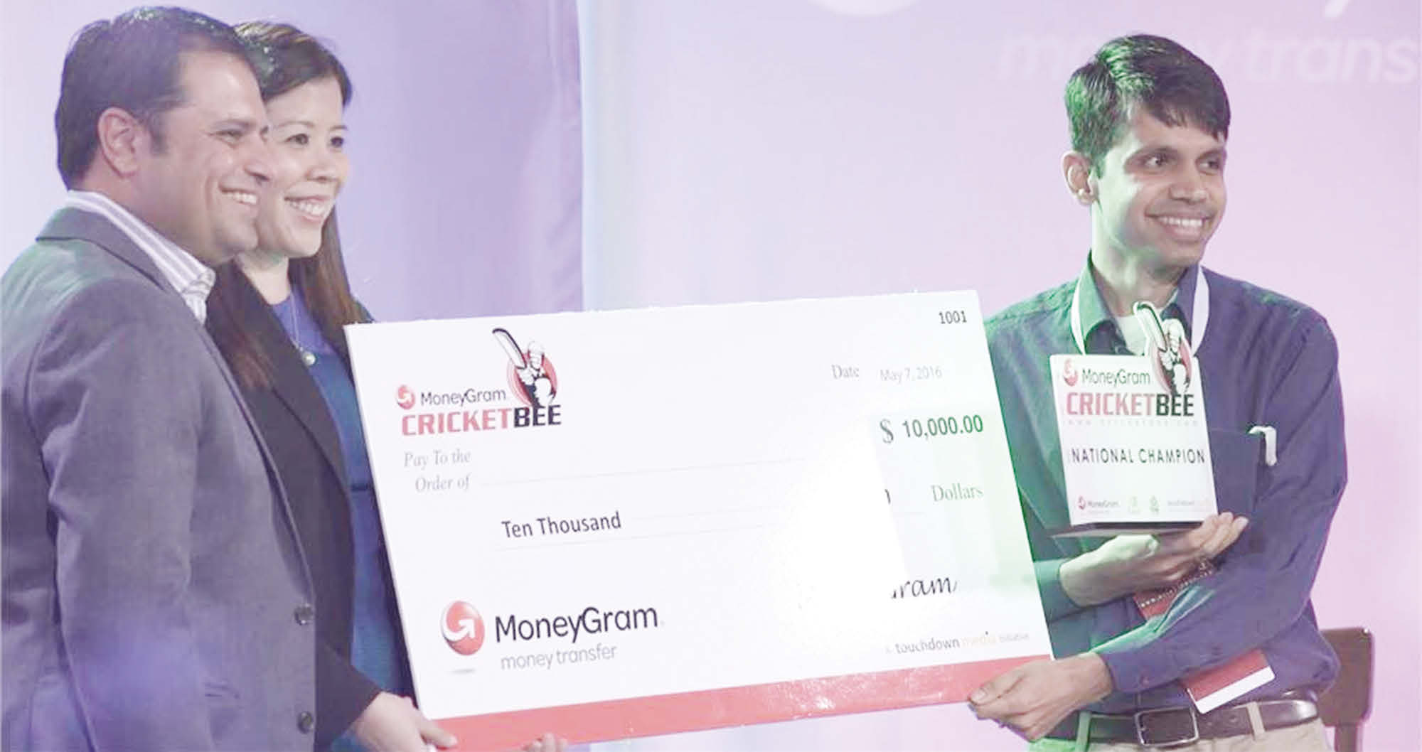Bharat Jayakumar of Sunnyvale, California bagged the title of Champion and $10,000 prize money. (Left to Right): Rahul Walia, founder of the MoneyGram Cricket Bee, Ivy Wisco, MoneyGram, Bharat Jayakumar, National Champion of the MoneyGram CricketBee