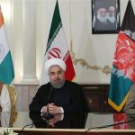 Rouhani, centre, hosts a meeting with the Indian Prime Minister, Narendra Modi, left, and Afghan President