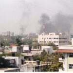 A mob stormed Gulbarg Society residential complex in Ahmedabad in 2002 and targeted Muslims during riots that swept state then led by Narendra Modi. The skyline of Ahmedabad filled with smoke as buildings and shops are set on fire by rioting mobs