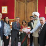 The INOC USA delegates greet Ambassador Das with flowers at the Indian Consulate in New York on May 31, 2016
