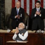 PM Modi greets the gathering as he arrives at the podium to address US Congress. Seen behind him are the US Vice President Joe Biden and House Speaker Paul Ryan.