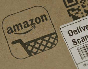SELLERS GAIN ON AMAZON AS IT CUTS OWN COMMISSIONS