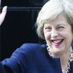 Britain's new Prime Minister Theresa May waves outside 10 Downing Street in central London on Jul 13, 2016, the day she takes office following the formal resignation of David Cameron.