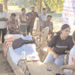 AmeriCares India's Dr. Swati Jha examines a flood survivor in Assam on August 4, 2016. | Photo Courtesy of AmeriCares India.