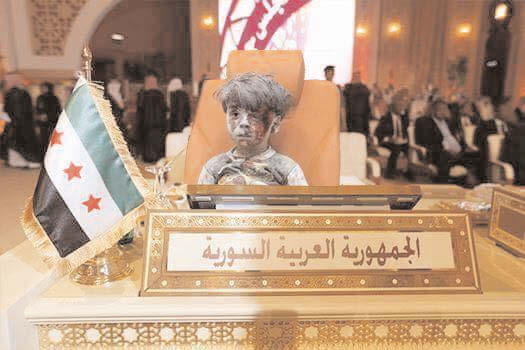 Haunting image of dazed, bloodied Syrian boy