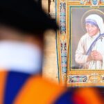 An image of Mother Teresa hangs from the facade of St. Peter's in the Vatican. - Image Courtesy - CNN